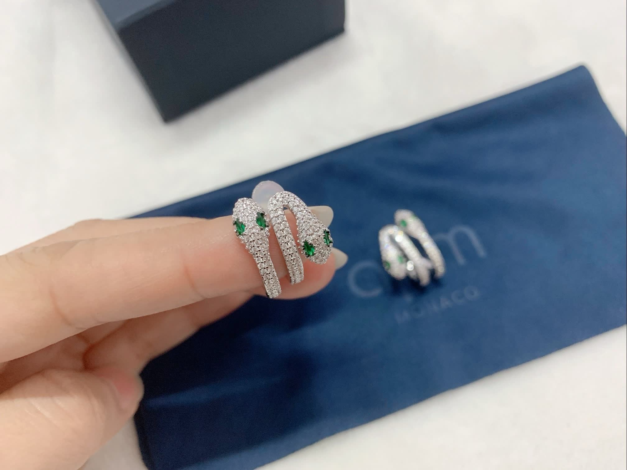 APM Monaco Emerald and Diamond Earrings